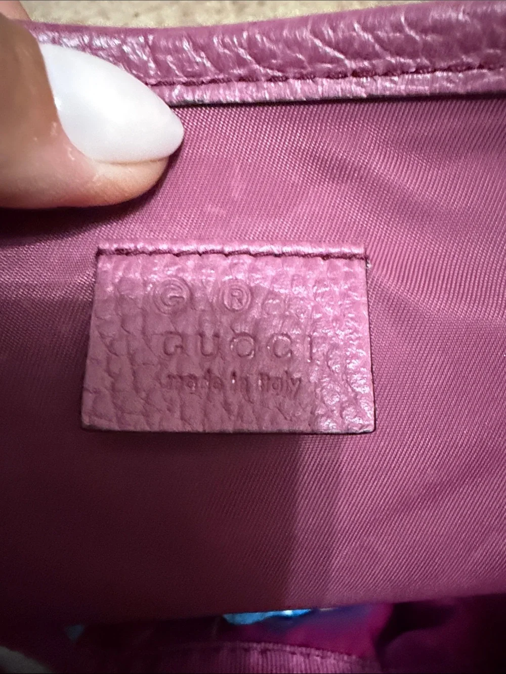 Gucci Beige Monogram Crossbody Diaper bag with Pink Trim.